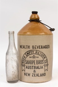 "DIGGER BRAND, BENDIGO" fruit cordial bottle, together with a "SHARPE BROS. HEALTH BEVERAGES" stoneware jar, 19th/20th century, 25cm and 35cm high