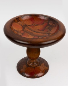 An Australian huon pine poker work compote adorned with fruit, circa 1930, 22cm high, 24cm diameter