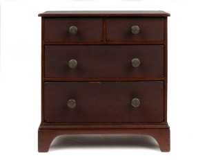 A Colonial miniature chest of four drawers, the ogee moulded base above bracket feet, cedar with pine secondary timbers, later brass drawer knobs, circa 1890 43cm high, 41cm wide, 21cm deep