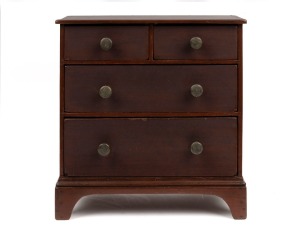 A Colonial miniature chest of four drawers, the ogee moulded base above bracket feet, cedar with pine secondary timbers, later brass drawer knobs, circa 1890 43cm high, 41cm wide, 21cm deep