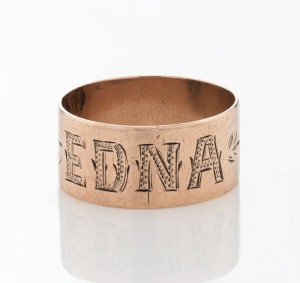 An antique Australian rose gold band, engraved "EDNA", stamped "9" flanked by pictorial marks, 4.5 grams