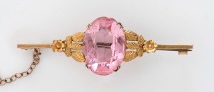 An antique 9ct yellow gold bar brooch, set with large pink stone, 19th century, stamped "9ct", ​​​​​​​5.5cm wide, 5.9 grams total