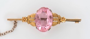 An antique 9ct yellow gold bar brooch, set with large pink stone, 19th century, stamped "9ct", 5.5cm wide, 5.9 grams total