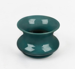 CRUFFEL green glazed porcelain vase, bearing original foil label to base, 6.5cm high, 9cm wide