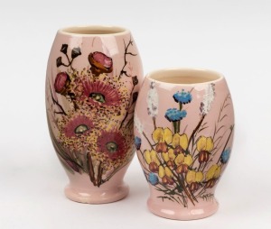 GUY BOYD two pink glazed pottery vases with wildflower decoration, incised "Guy Boyd", ​​​​​​​15.5cm and 12cm high