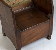 An early primitive Australian winged armchair/commode in the Georgian style, cedar and eucalyptus, Tasmanian origin, circa 1830s, purchased from Evandale antiques in 1977, 109cm high, 57cm across the arms. Illustrated in "Nineteenth Century Australian Fur - 2