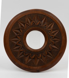 An antique circular chip carved kauri pine picture frame, 19th/20th century, 27.5cm diameter, internal 8cm diameter