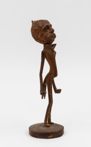 BILLY HUGHES carved wooden candle holder, 20th century, 23.5cm high