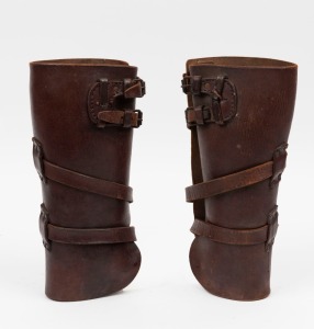 A pair of WW2 period leather gaiters, stamped with Defence Department broad arrow mark, and dated 1943, ​​​​​​​30cm high