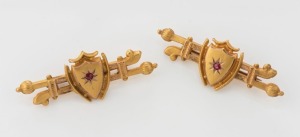 Two antique 9ct yellow gold bar brooches set with red stones, circa 1900, 5cm wide, 5 grams total