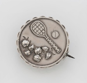 An antique English "Tennis" brooch in sterling silver, made in Birmingham, circa 1886, 3.2cm wide, 5.7 grams