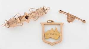 ARONSON & Co. 9ct gold and red stone bar brooch, together with a 9ct gold Tasmanian map brooch and Australian map pendant, both by WILLIS & Sons of Melbourne, 19th/20th century, (3 items), the largest 5.5cm wide, 6.7 grams total