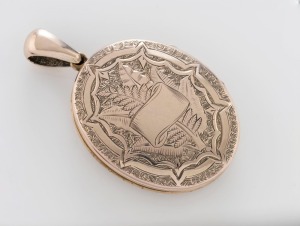 An antique English locket, sterling silver and gold, circa 1875, 5cm high overall, 11.2 grams total