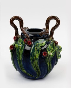 DAVID LYONS studio pottery vase with applied gumnuts, leaves and branches, glazed with cobalt blue coloured ground, incised "D.C. Lyons, VIC. Australia, 1/1" with oval impressed stamp. 19.5cm high