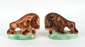 PATES POTTERY pair of bison bookends, factory stamp to bases, 13cm high, 16cm long