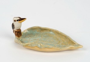 A.J. REAY pottery kookaburra ornament, incised "A.J. Reay, Bribie Island", 5cm high, 12cm wide
