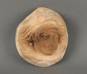 WILLIAM RICKETTS pottery face mask wall plaque, incised "Wm. Ricketts", 11cm high