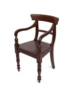 A Colonial Australian spade back carver chair, cedar and blackwood, Tasmanian origin, early to mid 19th century, 46cm across the arms