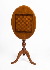 An antique Australian huon pine games-top wine table with tilt-top, 65cm high, 51cm wide, 36cm deep