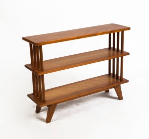 A vintage Australian kauri pine bookcase, circa 1950s, 67cm high, 89cm wide, 24cm deep