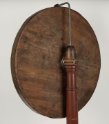 AN ANTIQUE AUSTRALIAN HORSE RACING WHEEL-OF-CHANCE A wheel-of-chance depicting twelve different Australian racehorses, painted and titled in oil paint on cedar, the wheel surrounded by brass strapping and mounted on a later stand; the wheel circa 1890. Ov - 3