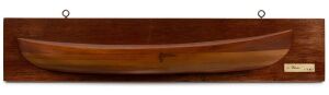 Antique whaler boat builder's half hull model, huon and King Billy pine on cedar board with bone plaque, 19th century, 79cm wide overall