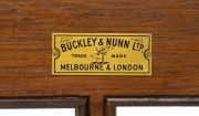 BUCKLEY & NUNN Australian Arts & Crafts solid blackwood bookcase, early 20th century, retailer's plaque inside the door, 139cm high, 92cm wide, 30cm deep - 2