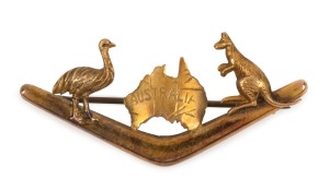 WILLIS & SONS of Melbourne 9ct yellow gold Australiana brooch with kangaroo and emu flanking an Australian map, perched on a boomerang, circa 1900, stamped "W.9." with pictorial mark, 5cm wide, 2.5 grams