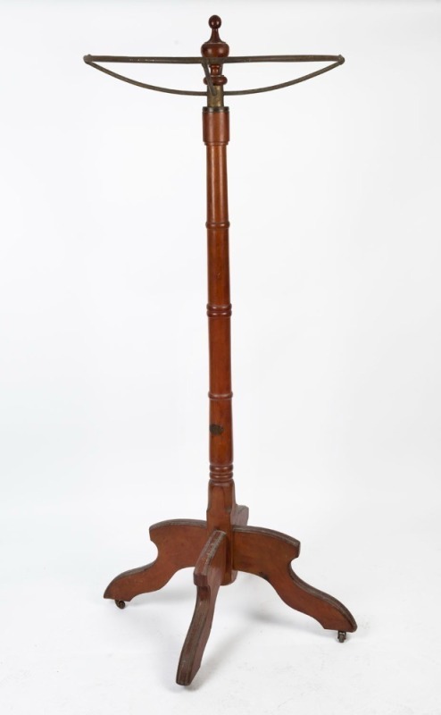 An antique Australian huon pine shop display clothes rack, bearing maker's plaque "CROWLEY & SON, Melbourne", late 19th century, 200cm high, top 77cm diameter, base 90cm wide