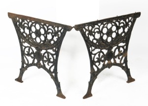 A pair of cast iron garden table ends. This design was popular in Melbourne in the 19th century, 62cm high, 68cm wide