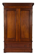 An antique Australian cedar two door wardrobe with blanket drawer, interior fitted with slides and drawer on the left side, 19th century, 219cm high, 136cm wide, 52cm deep