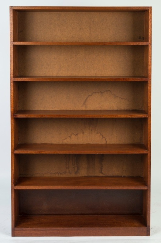 An Australian solid silky oak bookcase, Queensland origin, early 20th century, 153cm high, 90cm wide, 20cm deep