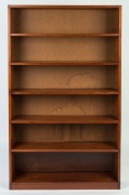 An Australian solid silky oak bookcase, Queensland origin, early 20th century, 153cm high, 90cm wide, 20cm deep