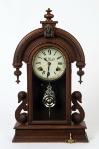 An antique Ansonia parlour clock with retailer's branding on the dial "MADE EXPRESSLY FOR HENRI, ISSELL & Co. LAUNCESTON & HOBART", 19th century, ​​​​​​​59cm high