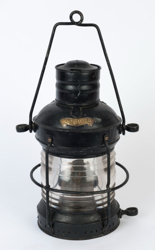 An antique ship's lantern with black painted finish and applied brass plaque "ANCHOR", 19th/20th century, 58cm high including handle