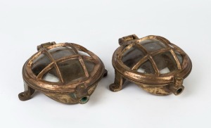A pair of vintage submarine passage lamps, cast brass and glass, 20th century, 27cm wide