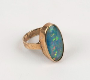 A vintage 9ct yellow gold and opal doublet ring, stamped "9ct", 4 grams