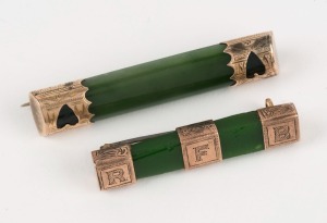 Two antique New Zealand greenstone bar brooches, both mounted in 9ct yellow gold, 19th century, the larger 5cm wide