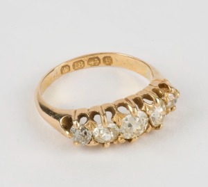 An antique 18ct yellow gold ring set with five graduated diamonds, 19th century