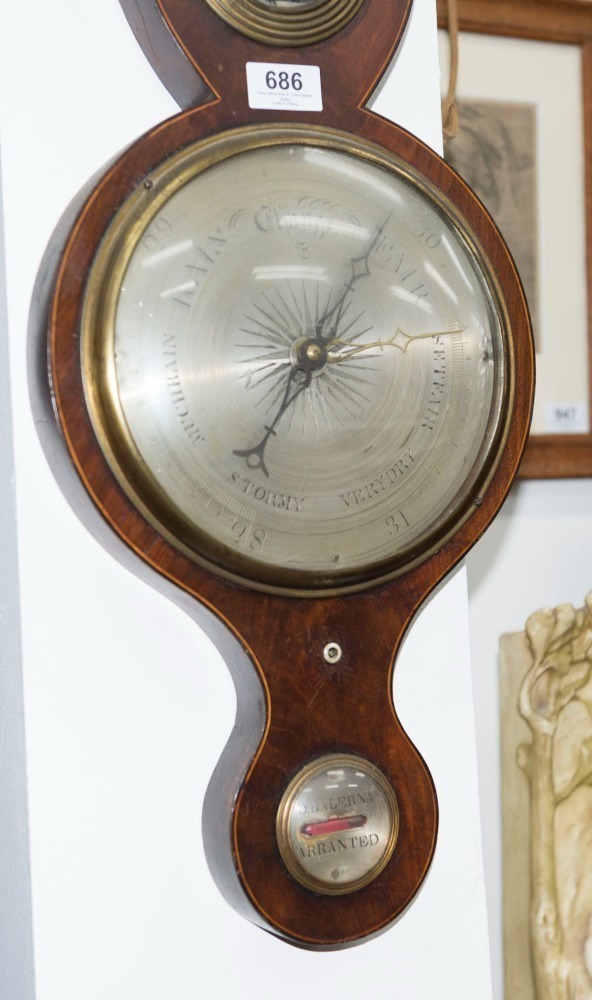 An antique English 8 inch wheel barometer in mahogany case with ebony ...