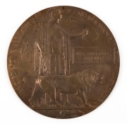 WWI BRONZE MEMORIAL PLAQUE: inscribed 'He Died for Freedom and Honour', in the name of 'LEO ALPHONSUS KENNEDY', and issued to his next of kin; pierced at top, blank on reverse, 120cm diameter, weight 14.7gr.