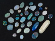 OPALS: group of 31 assorted polished stones including solids, doublets and triplets