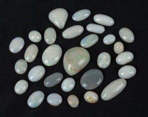 COOBER PEDY white opals, group of 27 polished solid stones, 21 grams, approximately 105ct