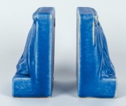 MELROSE WARE pair of bookends adorned with gumnuts and leaves with rare blue glaze, both bearing original paper labels, 14cm high - 2