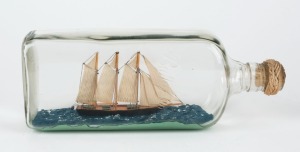 A vintage ship in a Ballantine's whisky bottle, 20th century, 24cm long