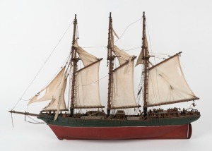 A model ship with three masts, 20th century, ​​​​​​​47cm high, 62cm long