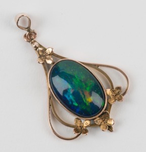 An antique 9ct gold and opal doublet pendant, early 20th century, 3.5cm high, 2.3 grams