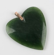 An antique New Zealand greenstone heart shaped pendant with rose gold mount, 19th century, ​​​​​​​4.5cm high