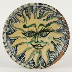 DEBORAH HALPERN pottery plate with hand-paint sunny face decoration, signed "Deborah D. Halpern", 27cm diameter