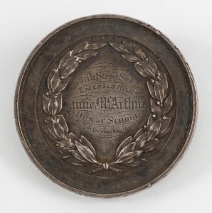 BANK STREET SCHOOL, EMERALD HILL, 1872, medal in silver (41.5mm) by W.J. Taylor London, inscribed on reverse 'Bank Street School /EMERALD HILL / Annie McArthur/ DUX of School/ 20th December 1872'. 